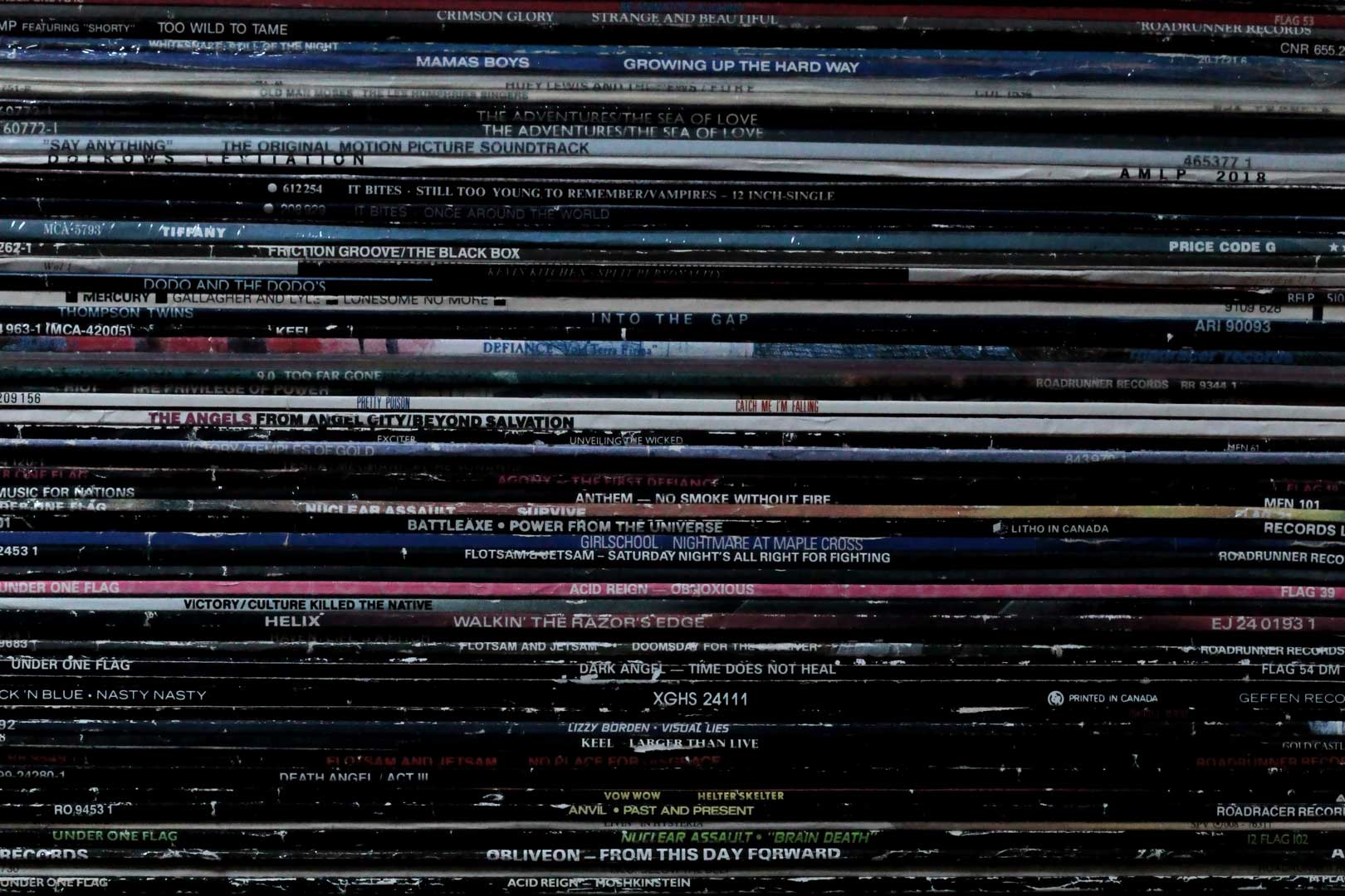 How Are Vinyl Records Made? Stack of Vinyl